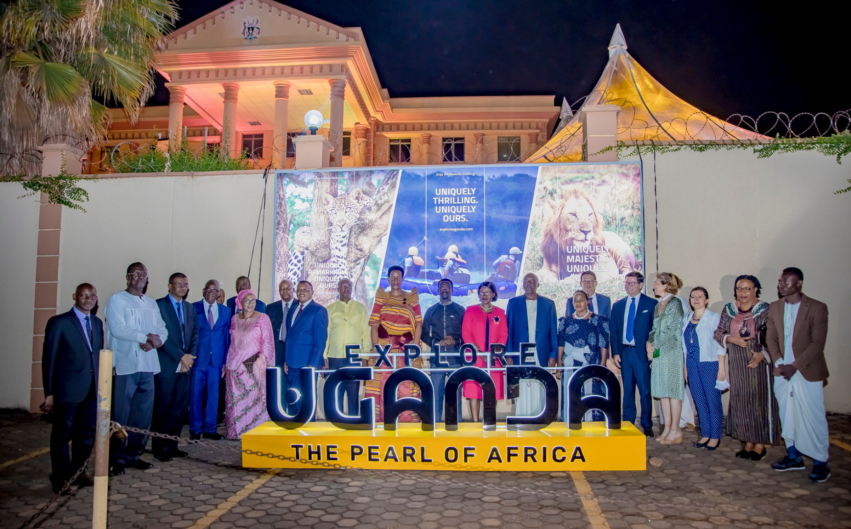 People standing in explore uganda event