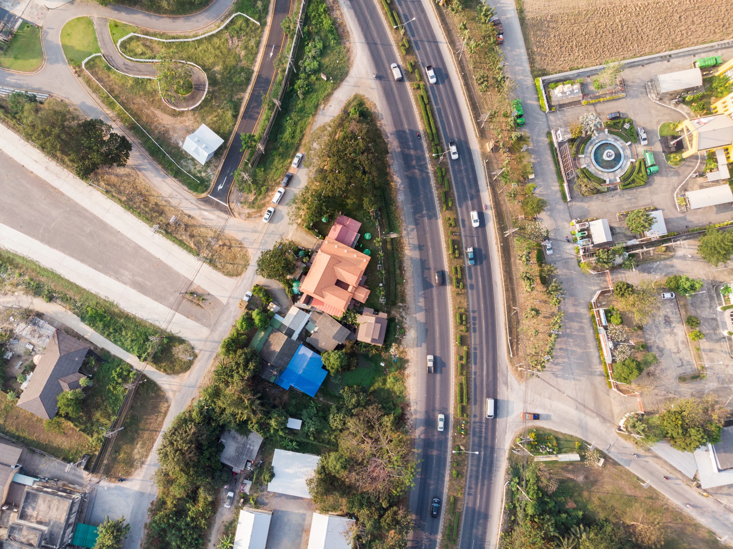 Traffic on highway with building and nature in evening Picking cashew nuts from a bowl