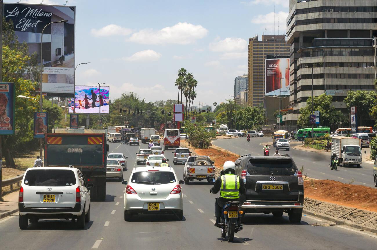 Vehicles driving on Uhuru Highway into Nairobi Central Business District (CBD), Kenya Vehicles driving on Uhuru Highway into Nairobi Central Business District (CBD), Kenya
