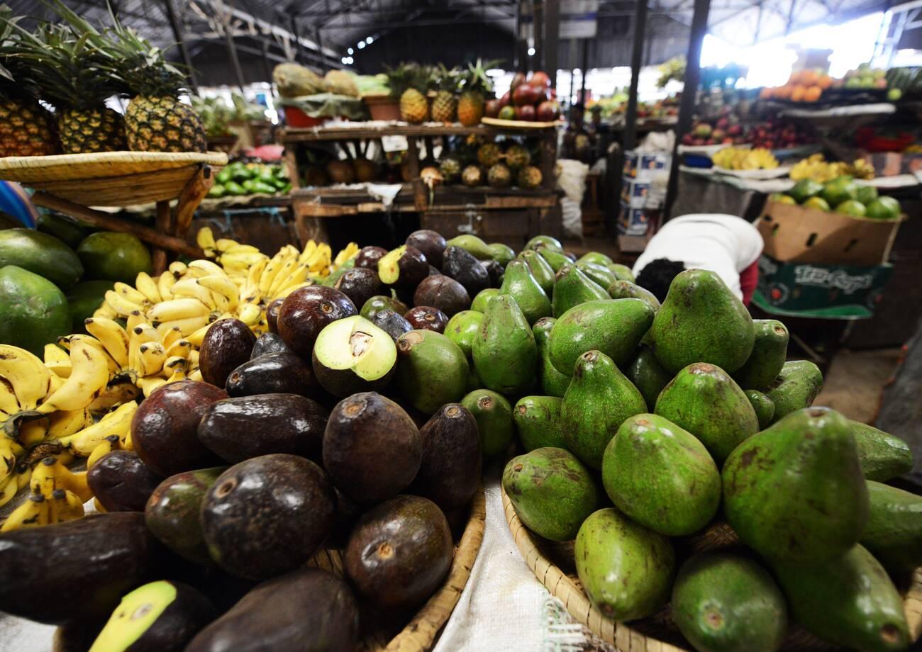 avocados in The vibrant Kimironko Market in Kigali, Rwanda. The vibrant Kimironko Market in Kigali, Rwanda.