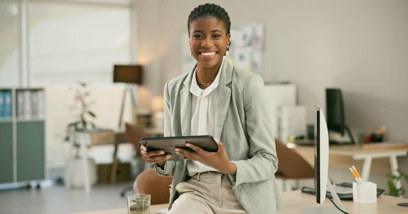 woman on tablet in business, office or corporate workplace in Nigeria woman on tablet in business, office or corporate workplace in Nigeria