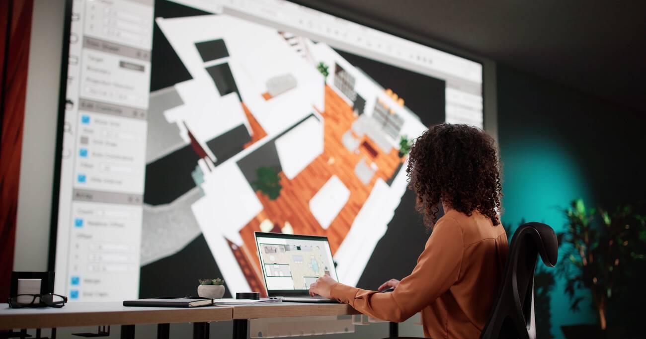 rchitect Using 3D Software Analyzing House Floor Plan For Renovation.