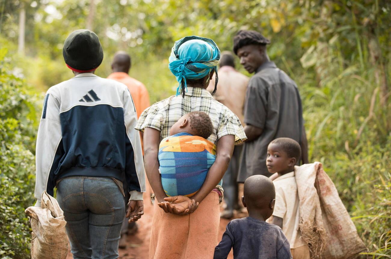 Workers and their children walk through Workers and their children walk through.