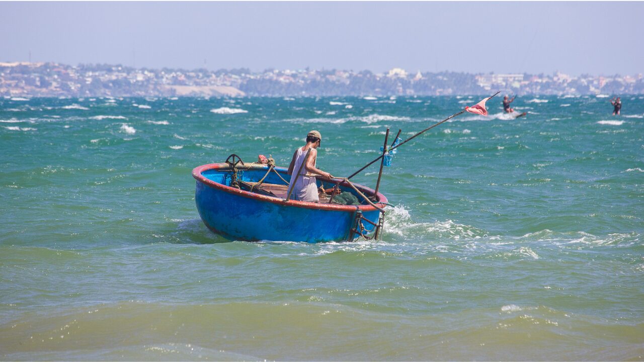a man fishing on boat in sea a man fishing on boat in sea