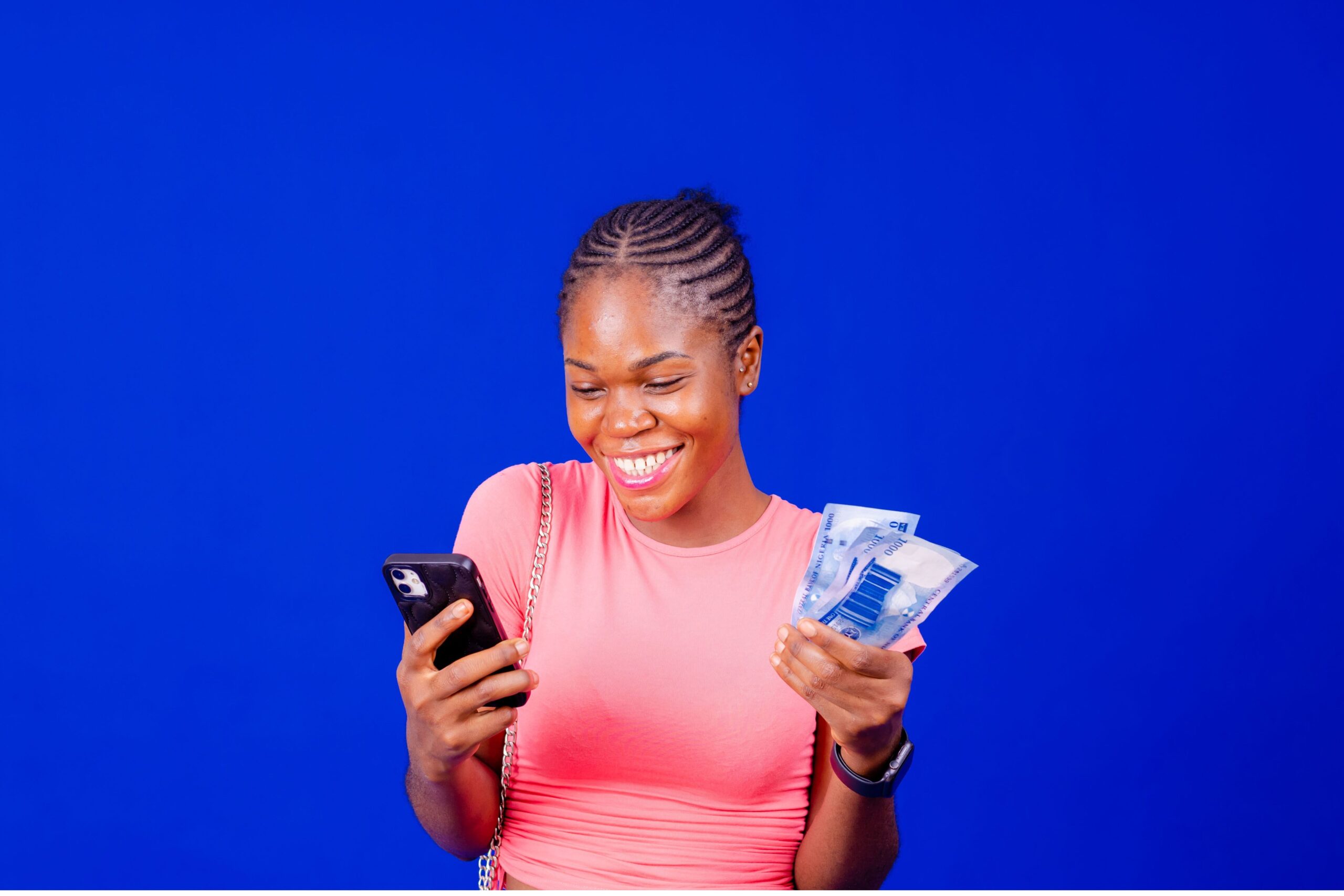 women hold cash